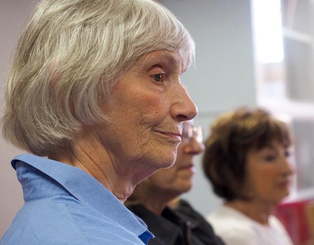 Lady listening to meeting