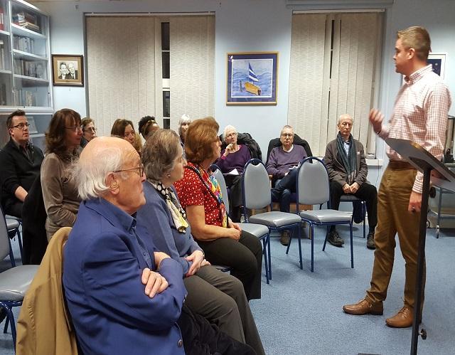 Man talking to group about Tinnitus 